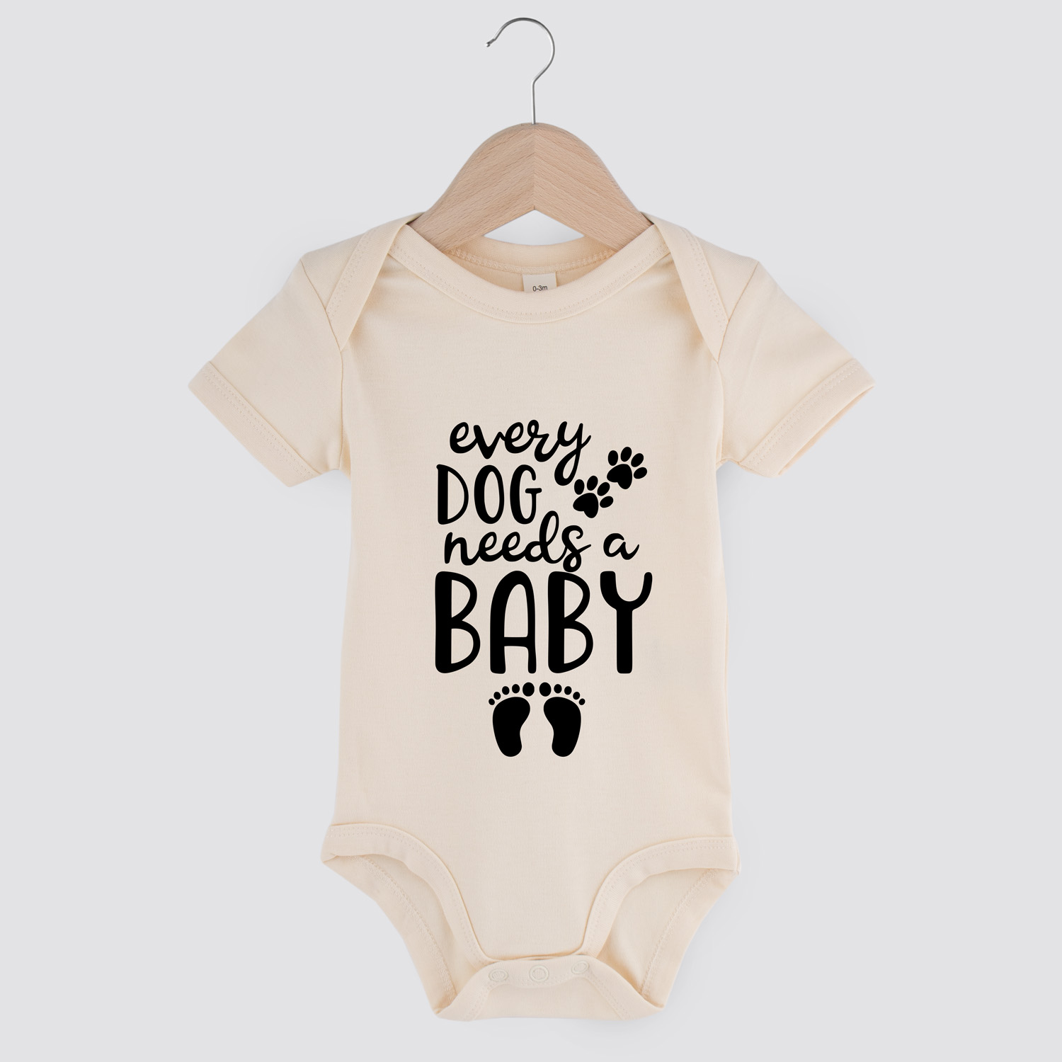 every-dog-needs-a-baby-baby-romper-natural.jpg